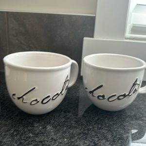 Set of white mugs